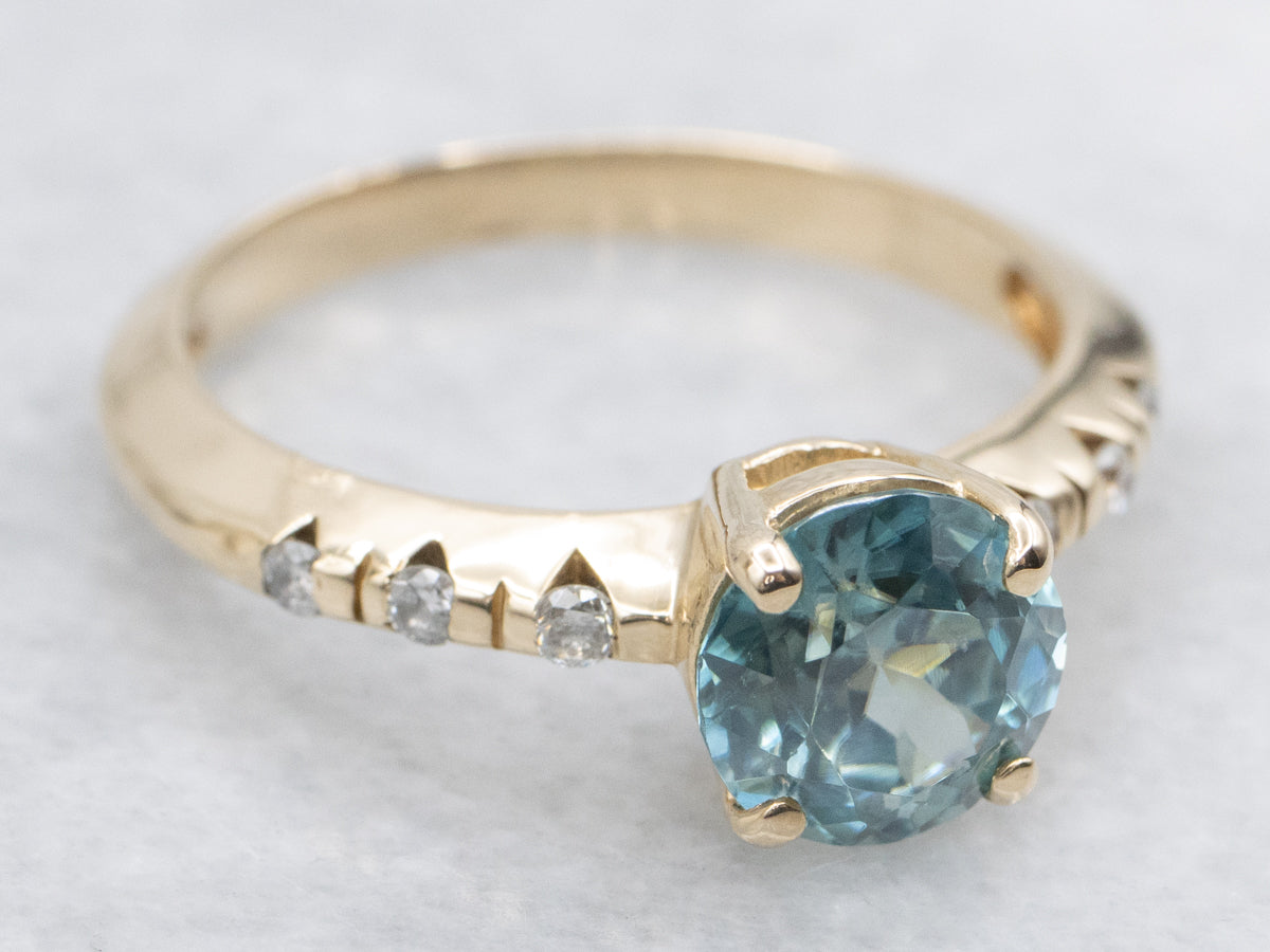 Round Cut Blue Zircon and Diamond Ring