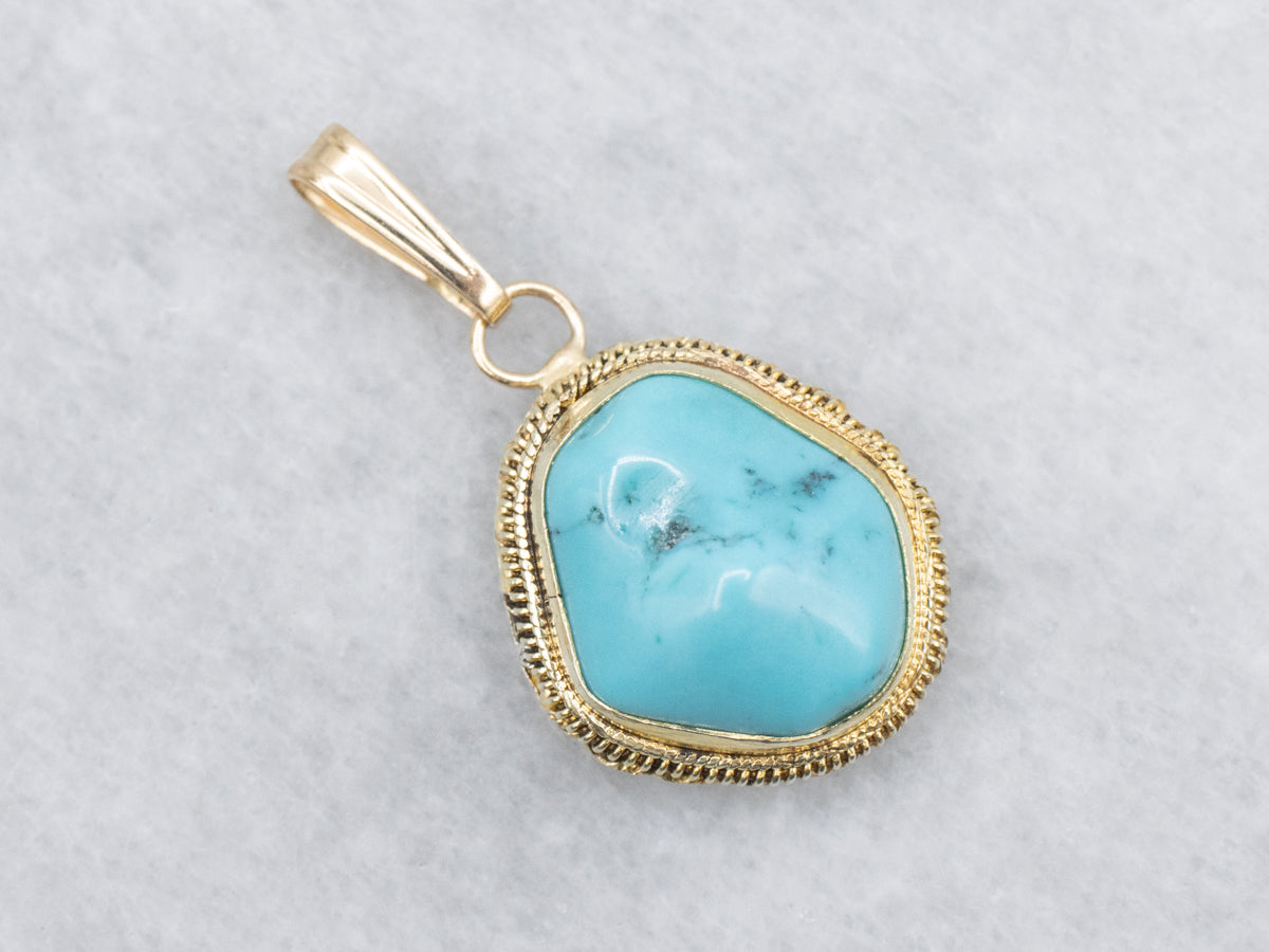 Turquoise Nugget Pendant Set in Yellow Gold
