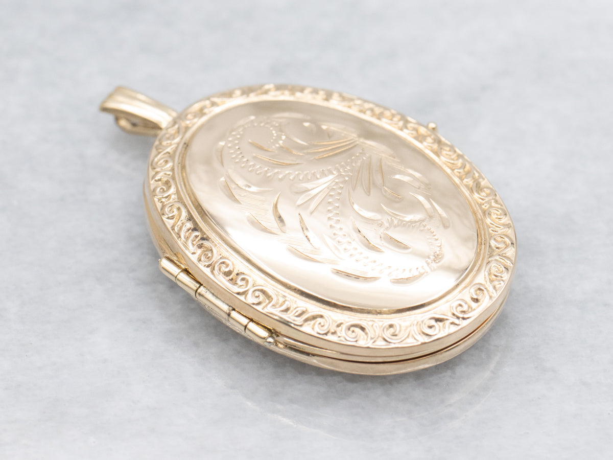 Engraved Gold Oval Locket with Patterned Edges