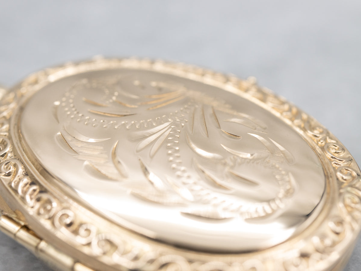 Engraved Gold Oval Locket with Patterned Edges
