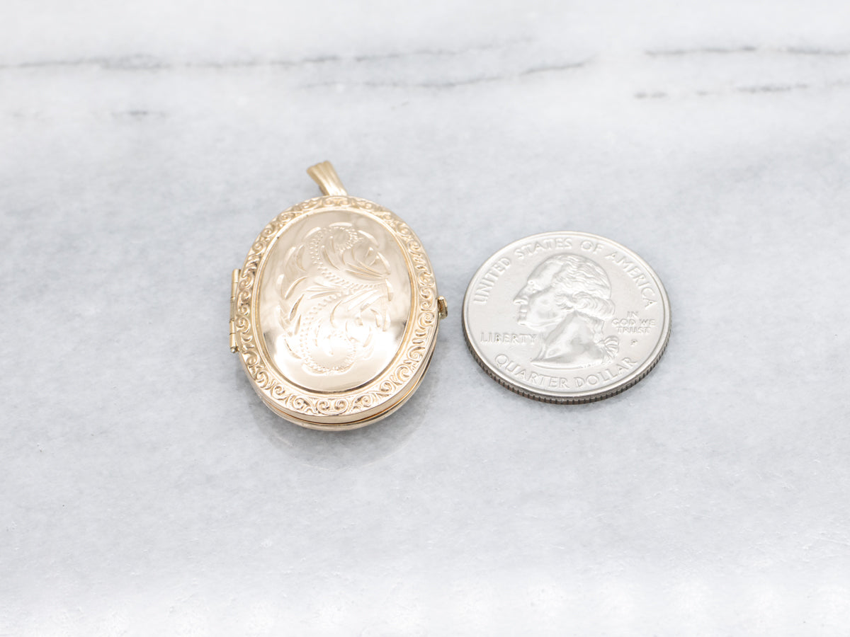 Engraved Gold Oval Locket with Patterned Edges