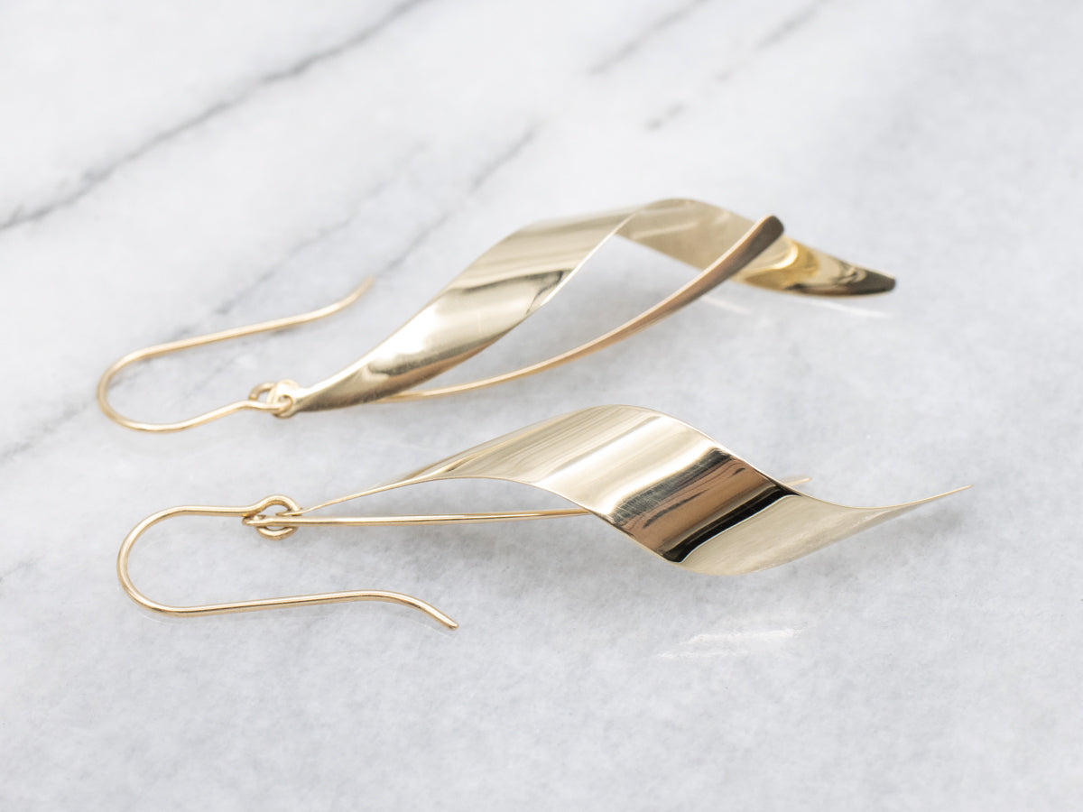 Twisting Polished Gold Ribbon Drop Earrings