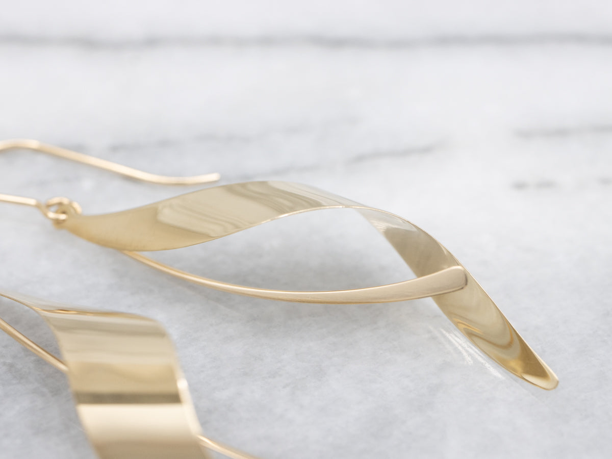 Twisting Polished Gold Ribbon Drop Earrings