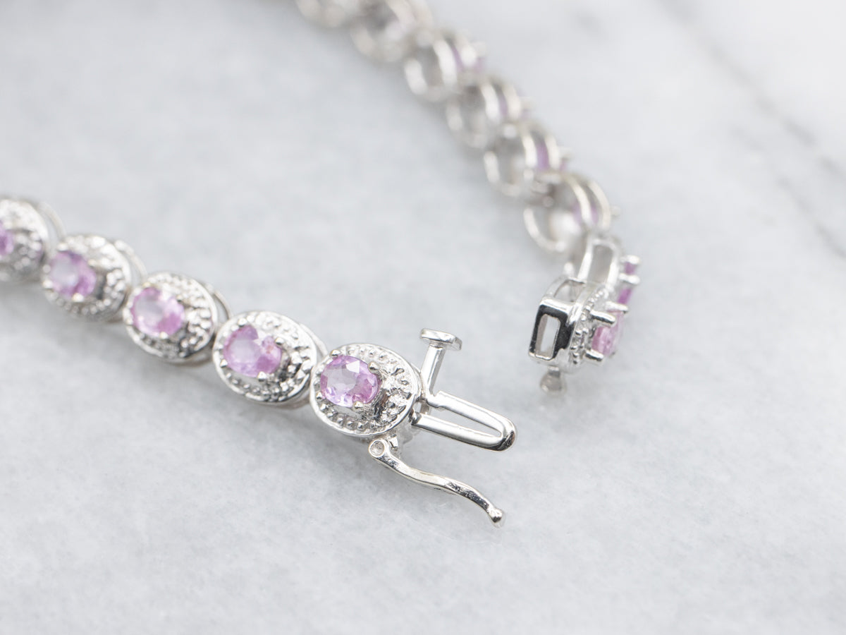 Modern Pink Sapphire and Diamond Halo White Gold Bracelet