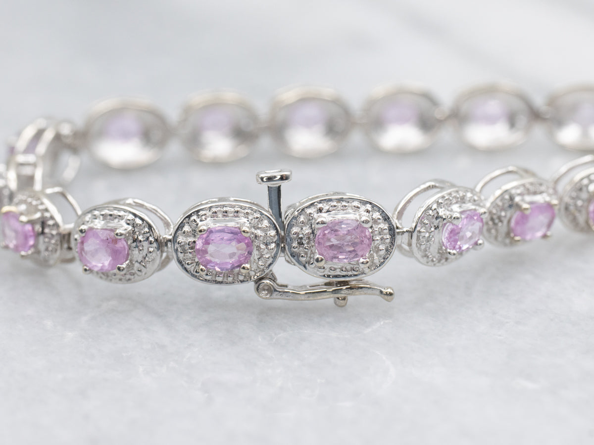 Modern Pink Sapphire and Diamond Halo White Gold Bracelet