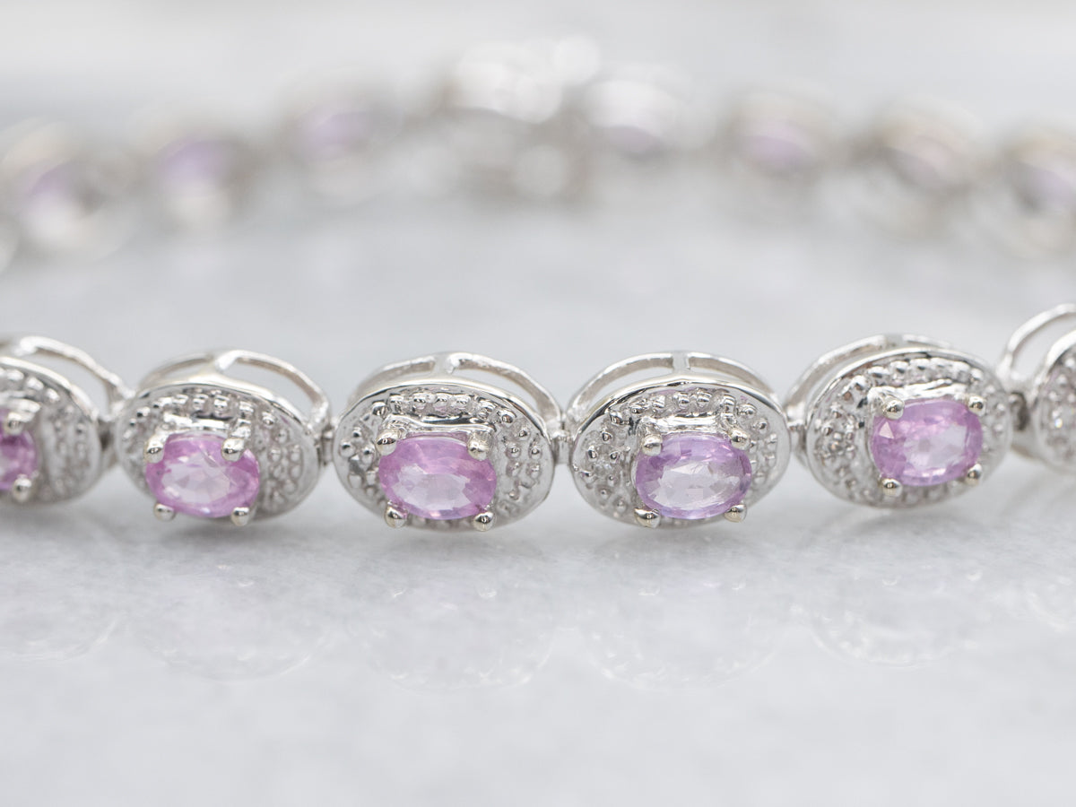 Modern Pink Sapphire and Diamond Halo White Gold Bracelet