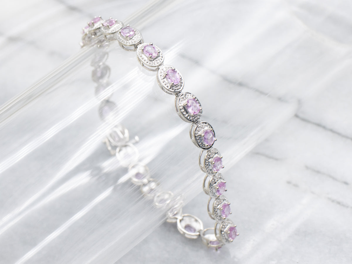 Modern Pink Sapphire and Diamond Halo White Gold Bracelet