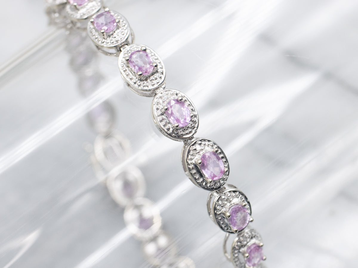 Modern Pink Sapphire and Diamond Halo White Gold Bracelet