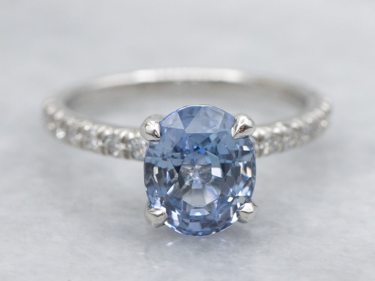 Modern Light Blue Sapphire and Diamond Accent Platinum Engagement Ring