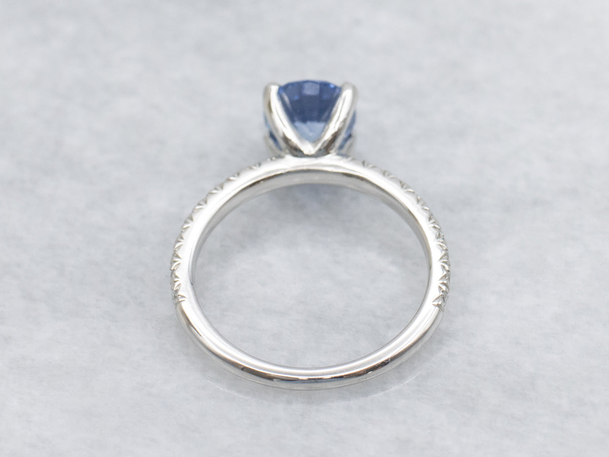 Modern Light Blue Sapphire and Diamond Accent Platinum Engagement Ring