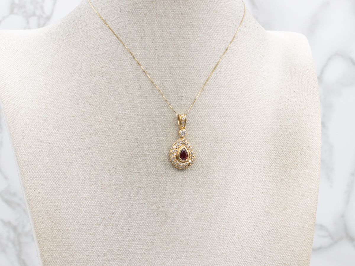 Modern Teardrop Ruby and Diamond Halo Pendant