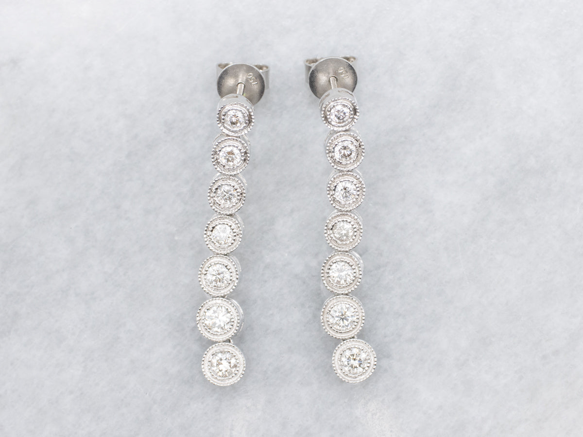 Bezel Set Graduated Diamond White Gold Drop Earrings