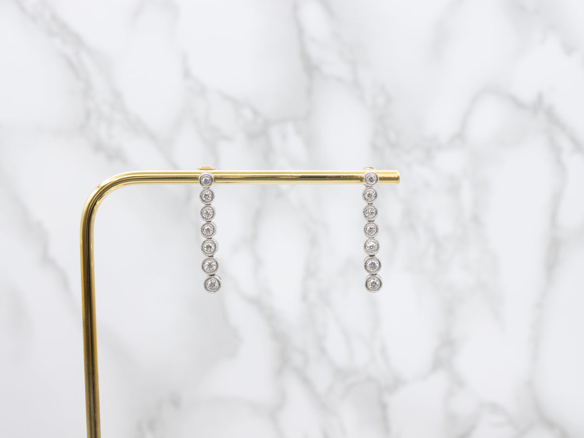 Bezel Set Graduated Diamond White Gold Drop Earrings