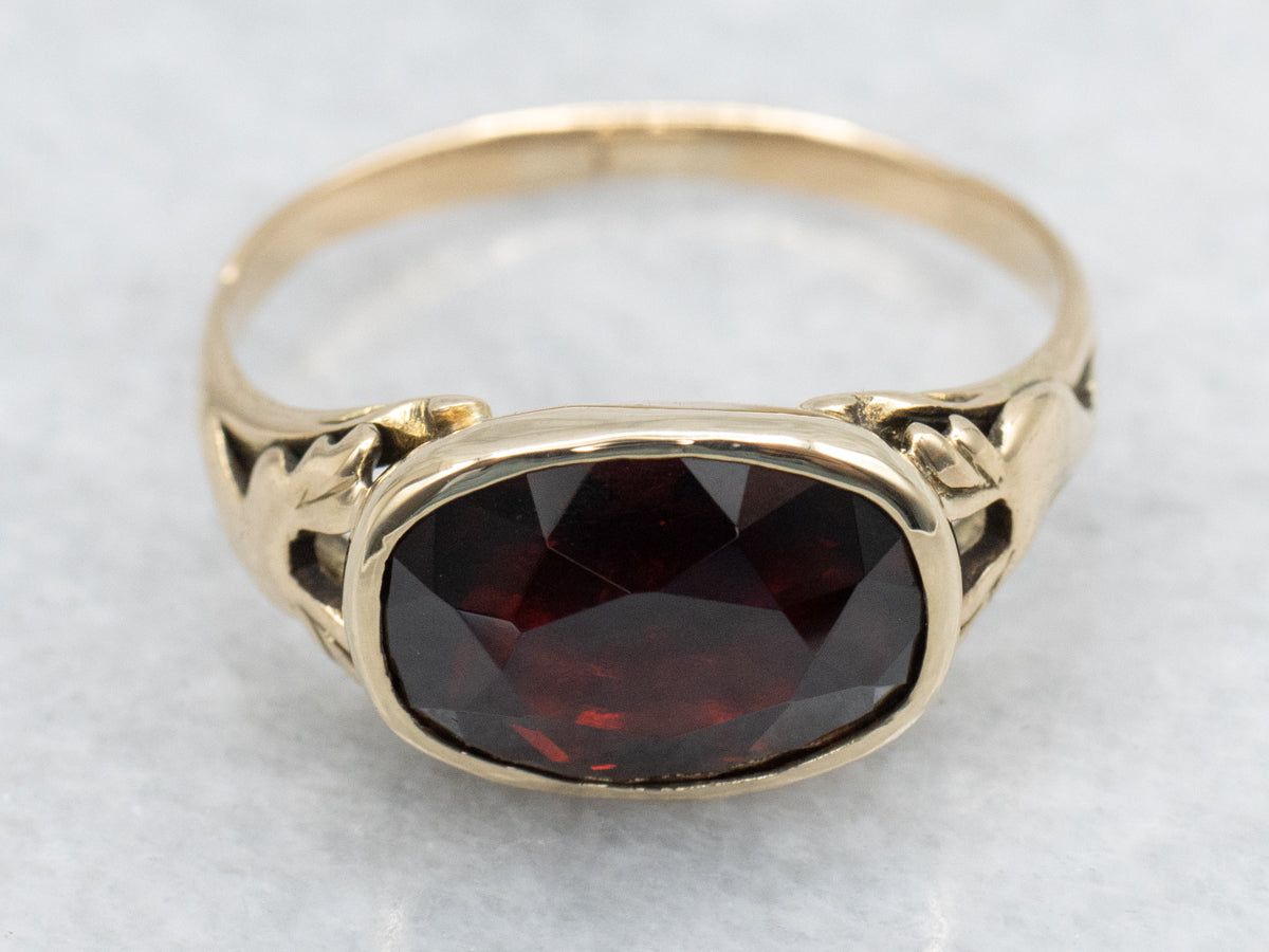 East-to-West Garnet Vintage Solitaire Ring