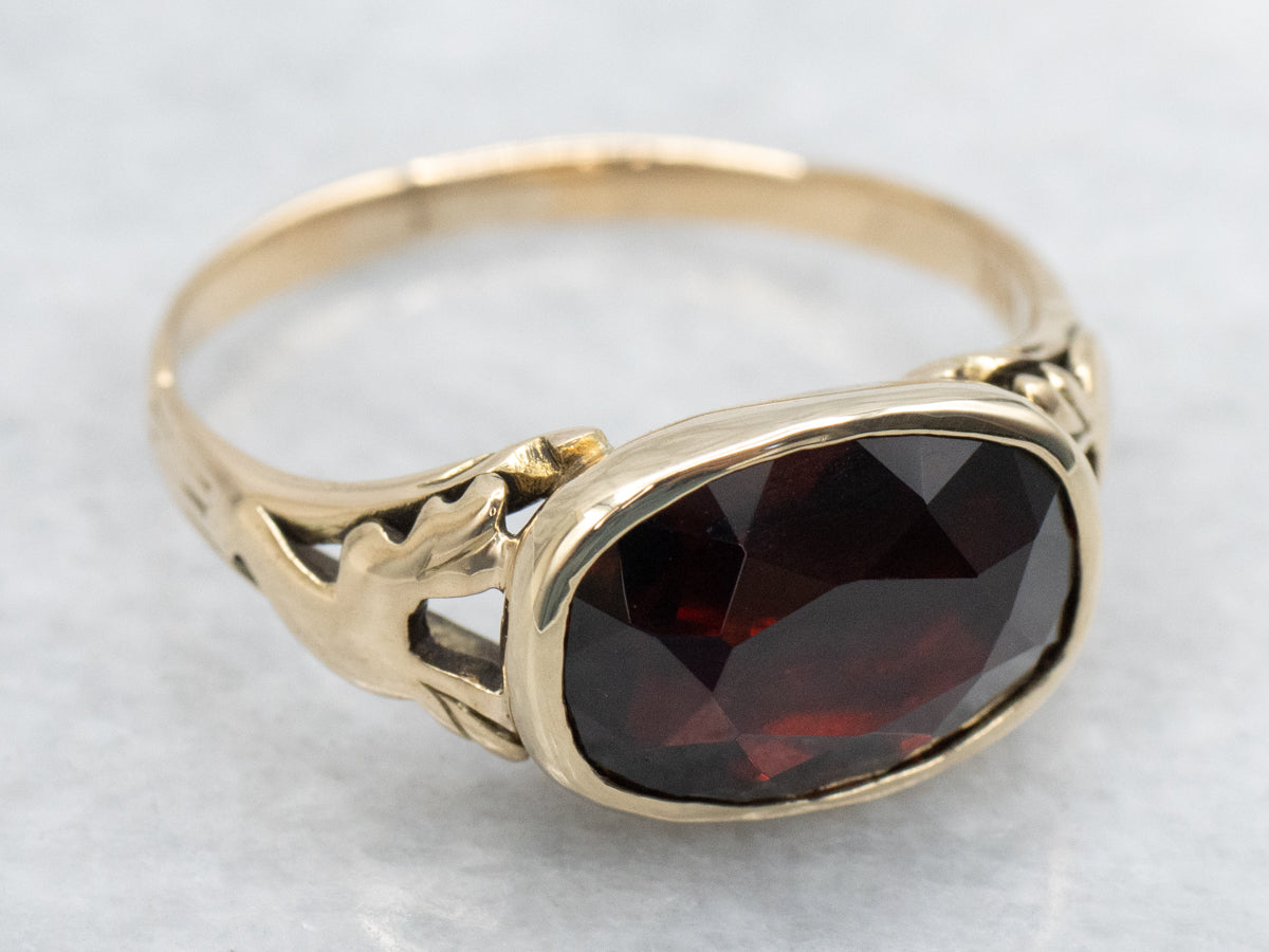 East-to-West Garnet Vintage Solitaire Ring