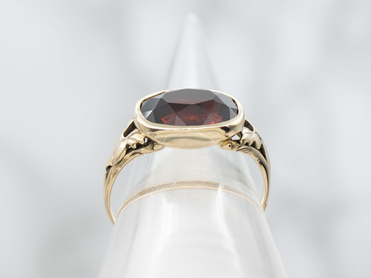 East-to-West Garnet Vintage Solitaire Ring