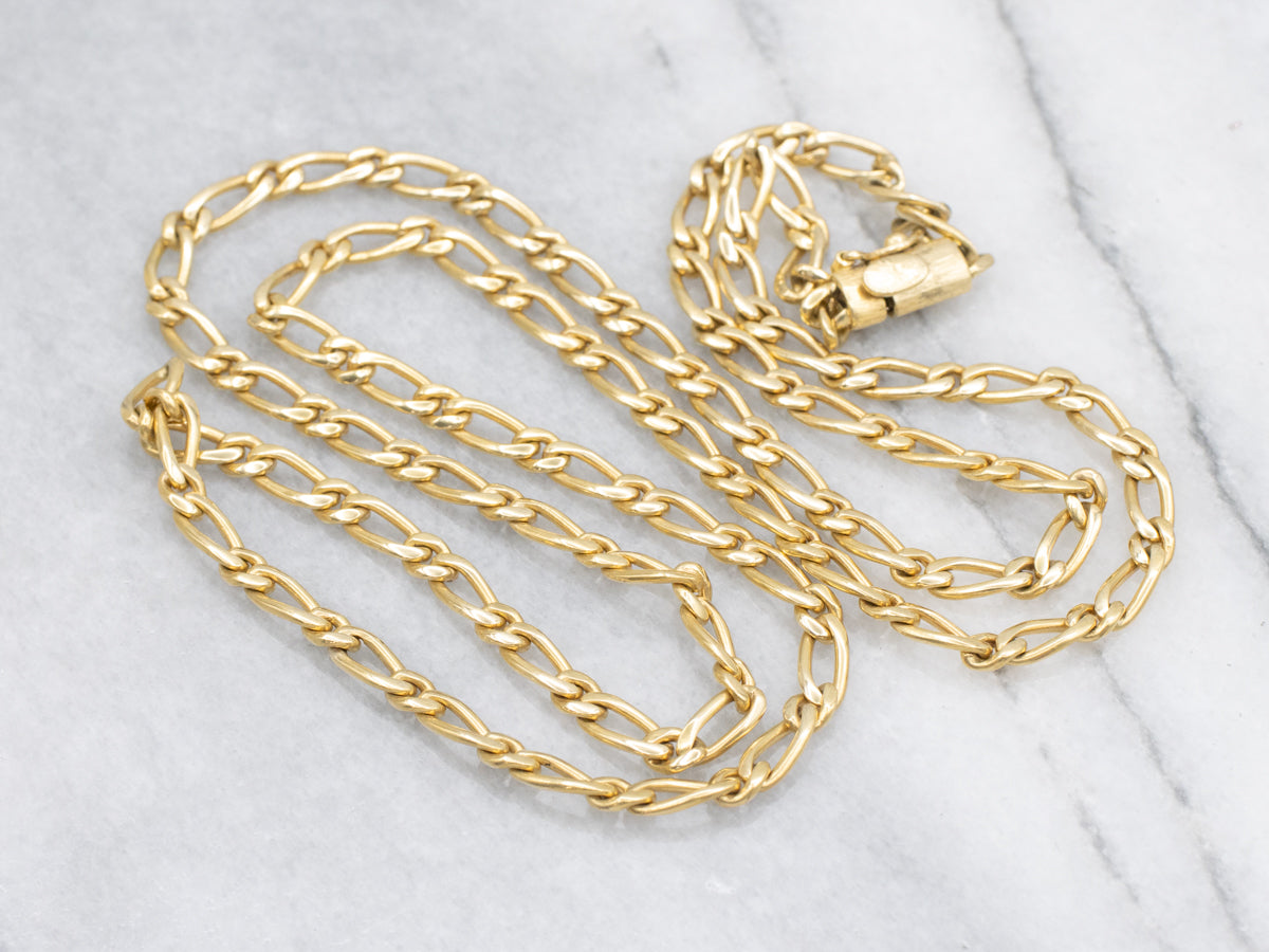 Long Yellow Gold Figaro Chain