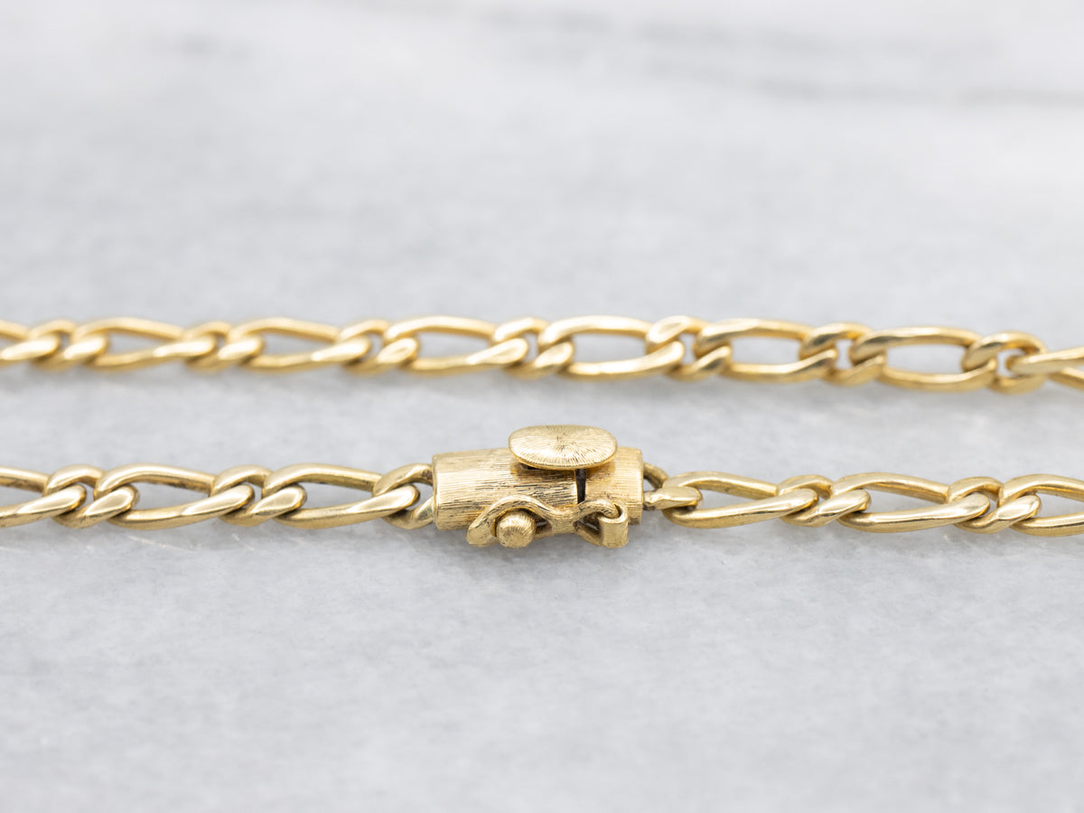 Long Yellow Gold Figaro Chain
