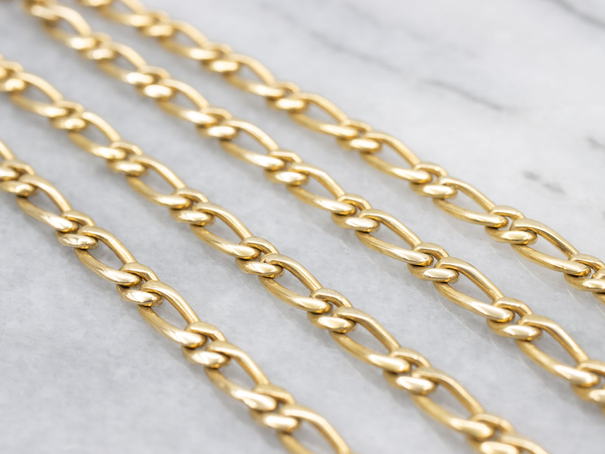 Long Yellow Gold Figaro Chain