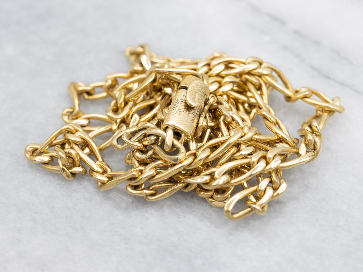 Long Yellow Gold Figaro Chain