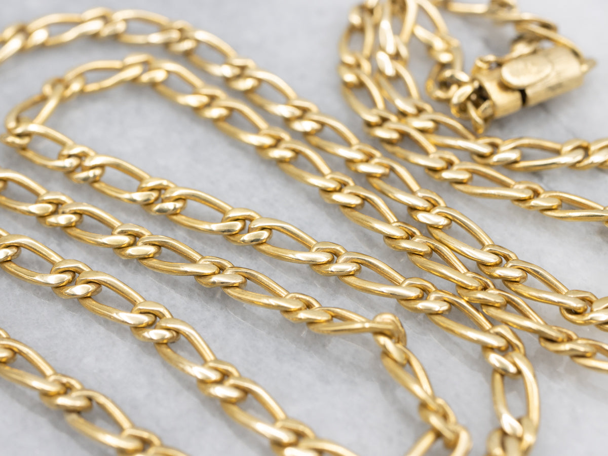 Long Yellow Gold Figaro Chain