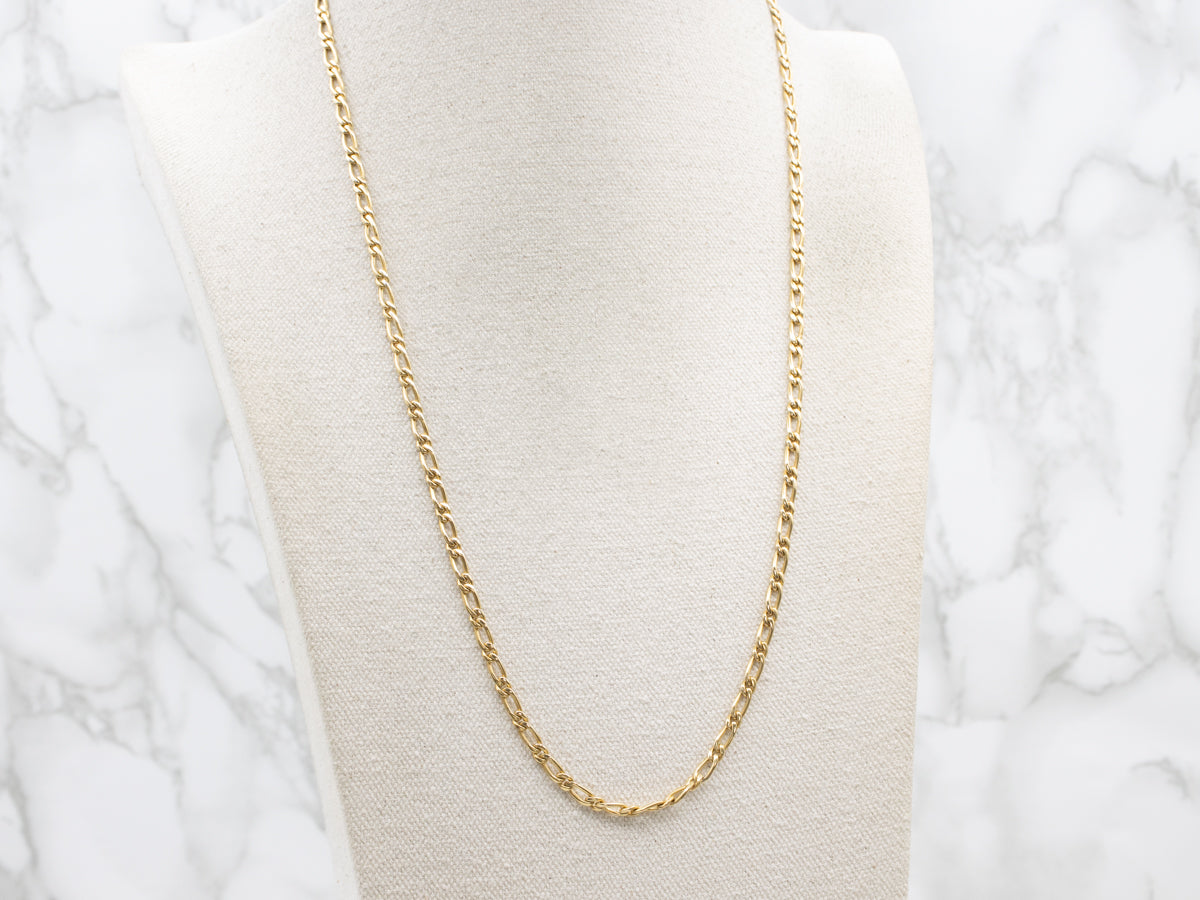 Long Yellow Gold Figaro Chain