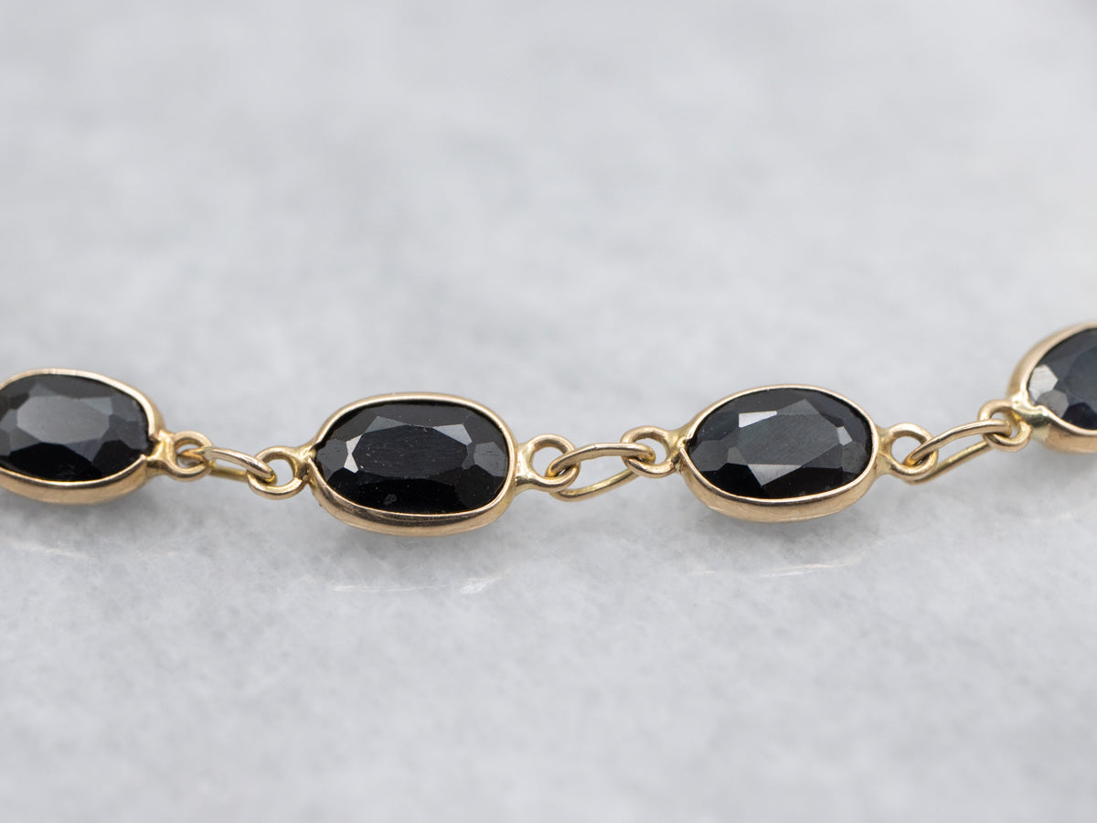 Dark Blue Sapphire Bezel-Set Gold Link Bracelet