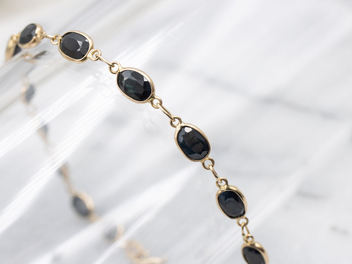 Dark Blue Sapphire Bezel-Set Gold Link Bracelet