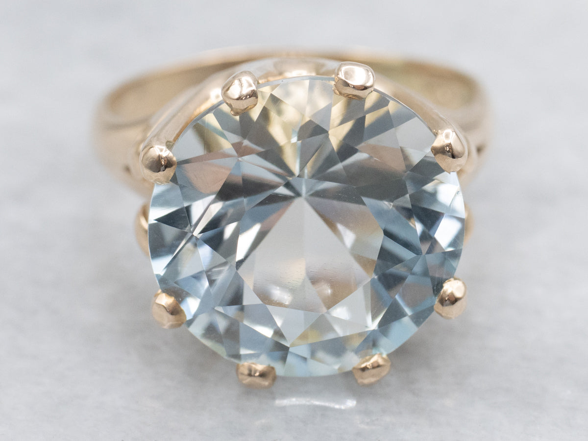 Round Cut Blue Topaz Gold Cocktail Ring