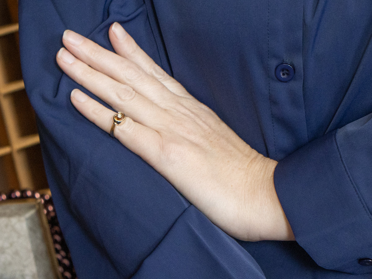 Swirling Bezel Set Diamond Solitaire Ring