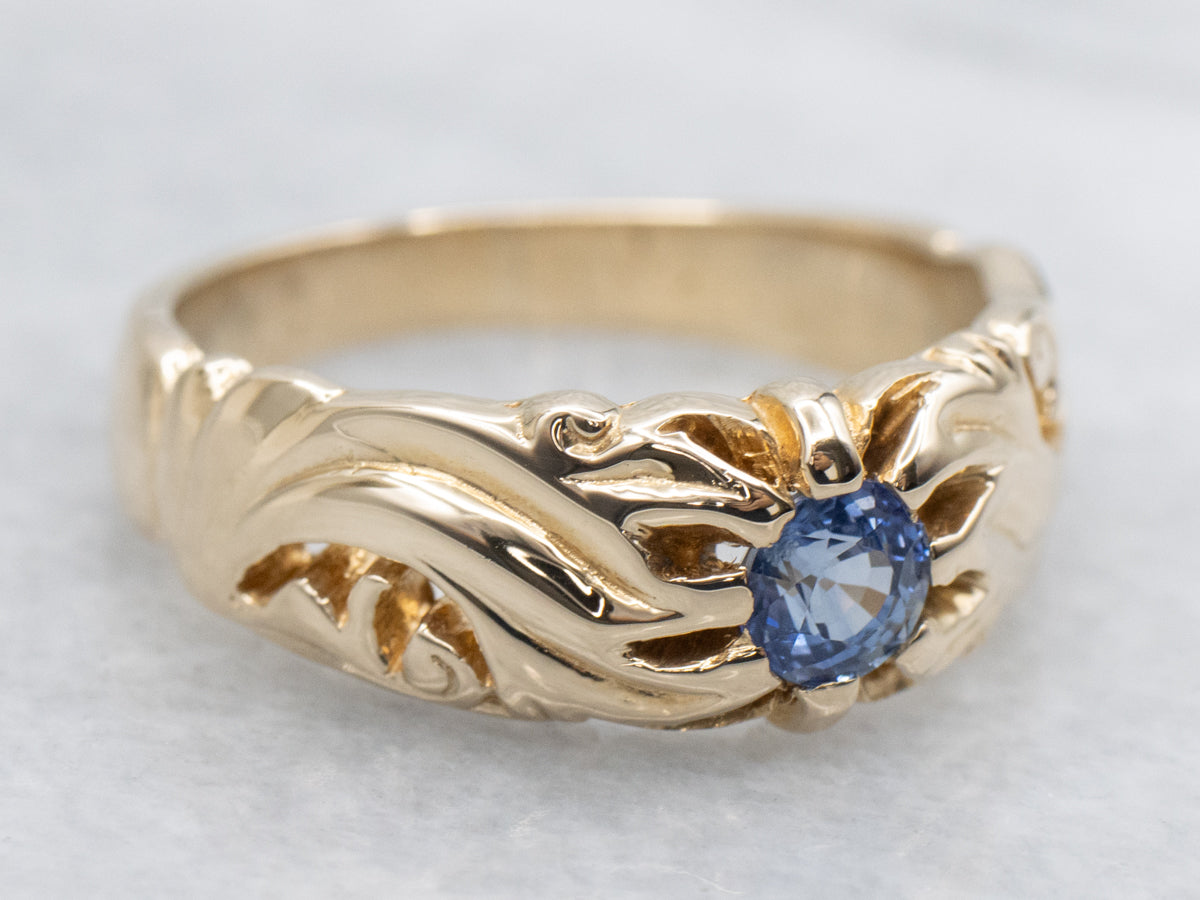 Scrolling 1920s Carved Belcher-Set Sapphire Solitaire Ring