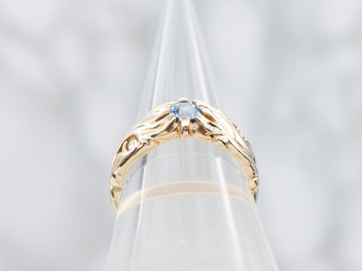 Scrolling 1920s Carved Belcher-Set Sapphire Solitaire Ring