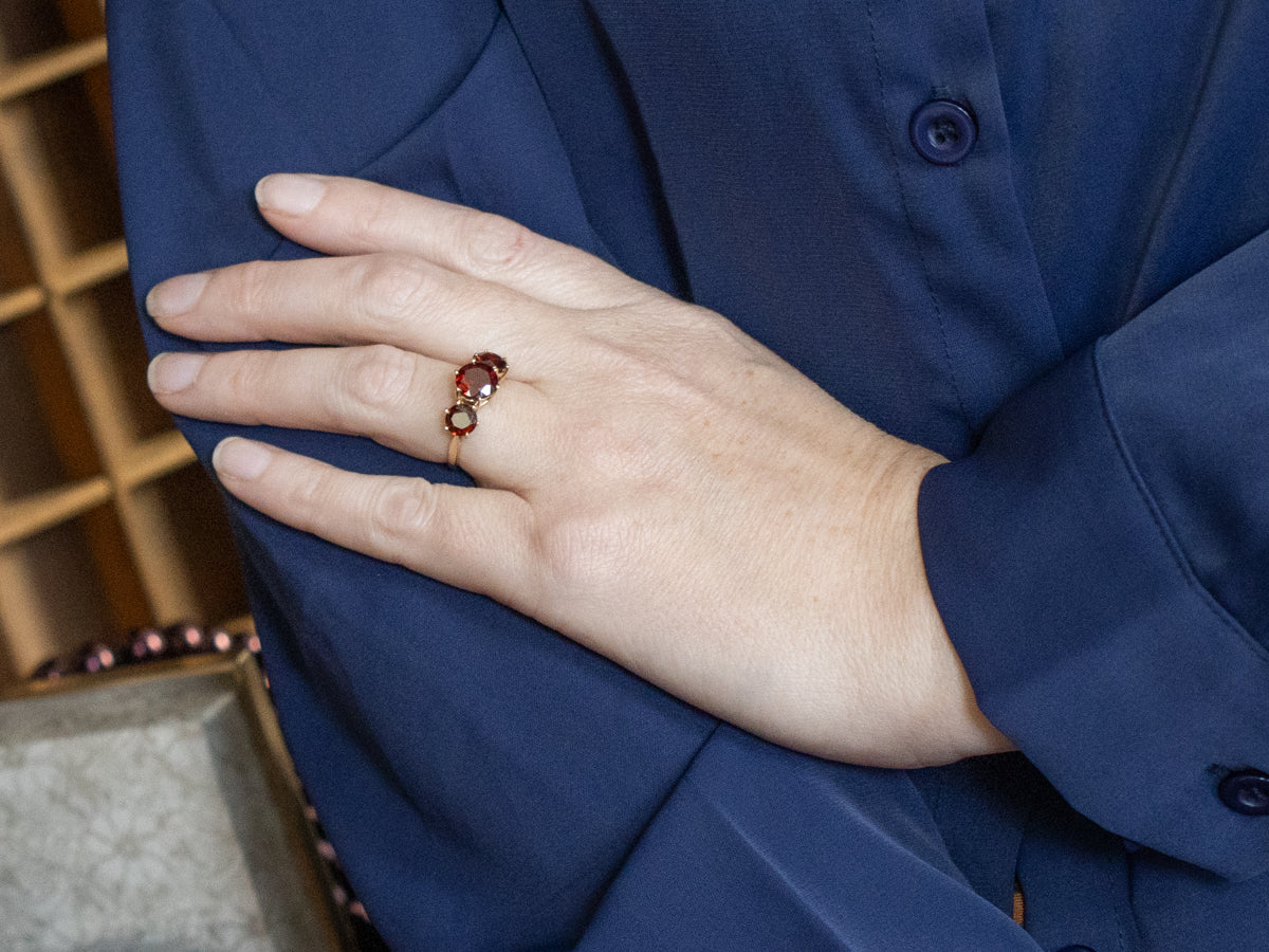 Three Stone Garnet and Gold Ring Ring