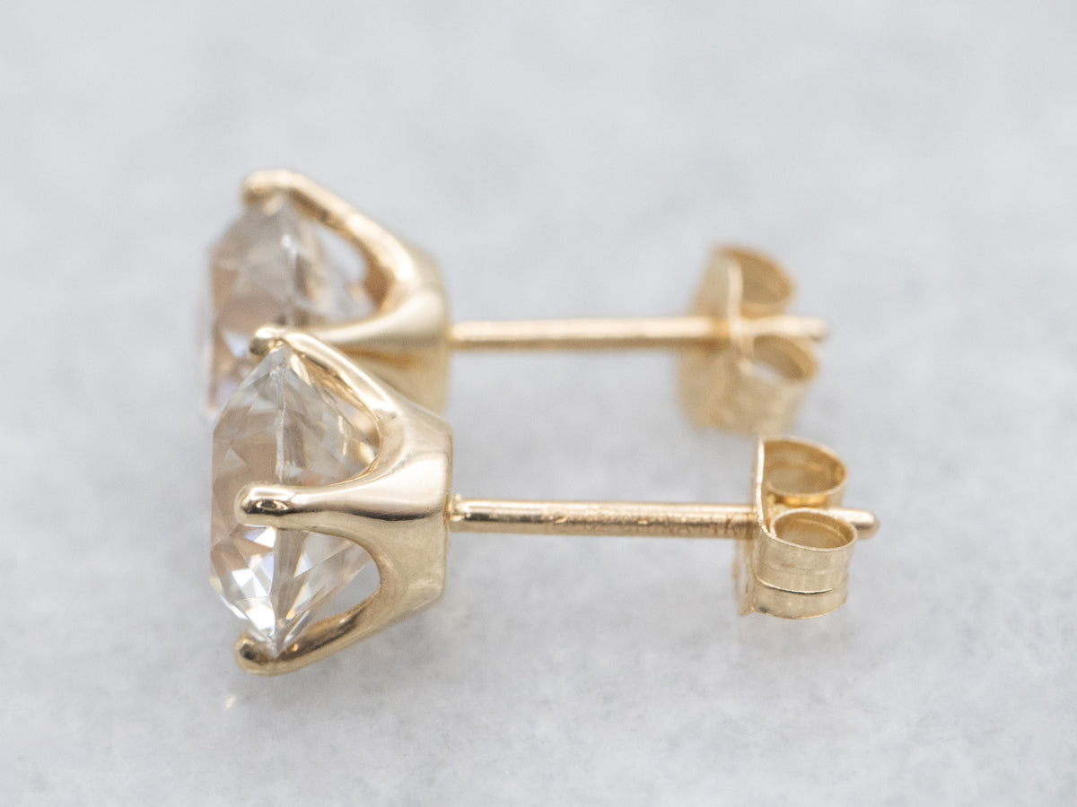 White Zircon Solitaire Gold Stud Earrings