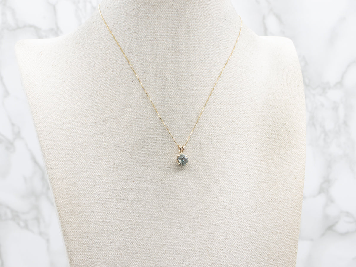 Teal and Champagne Hued Zircon Pendant