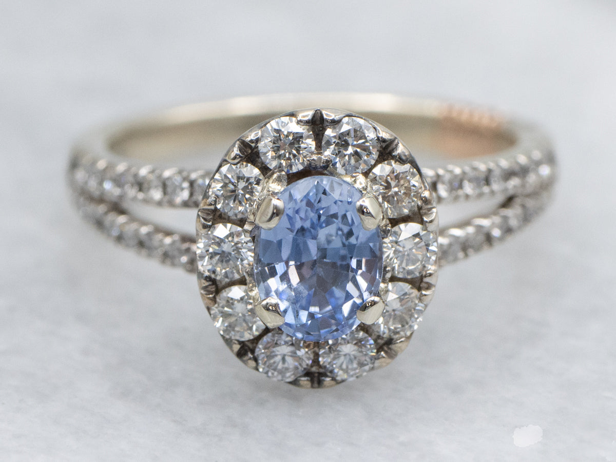 Pretty Sapphire and Diamond Halo Engagement Ring