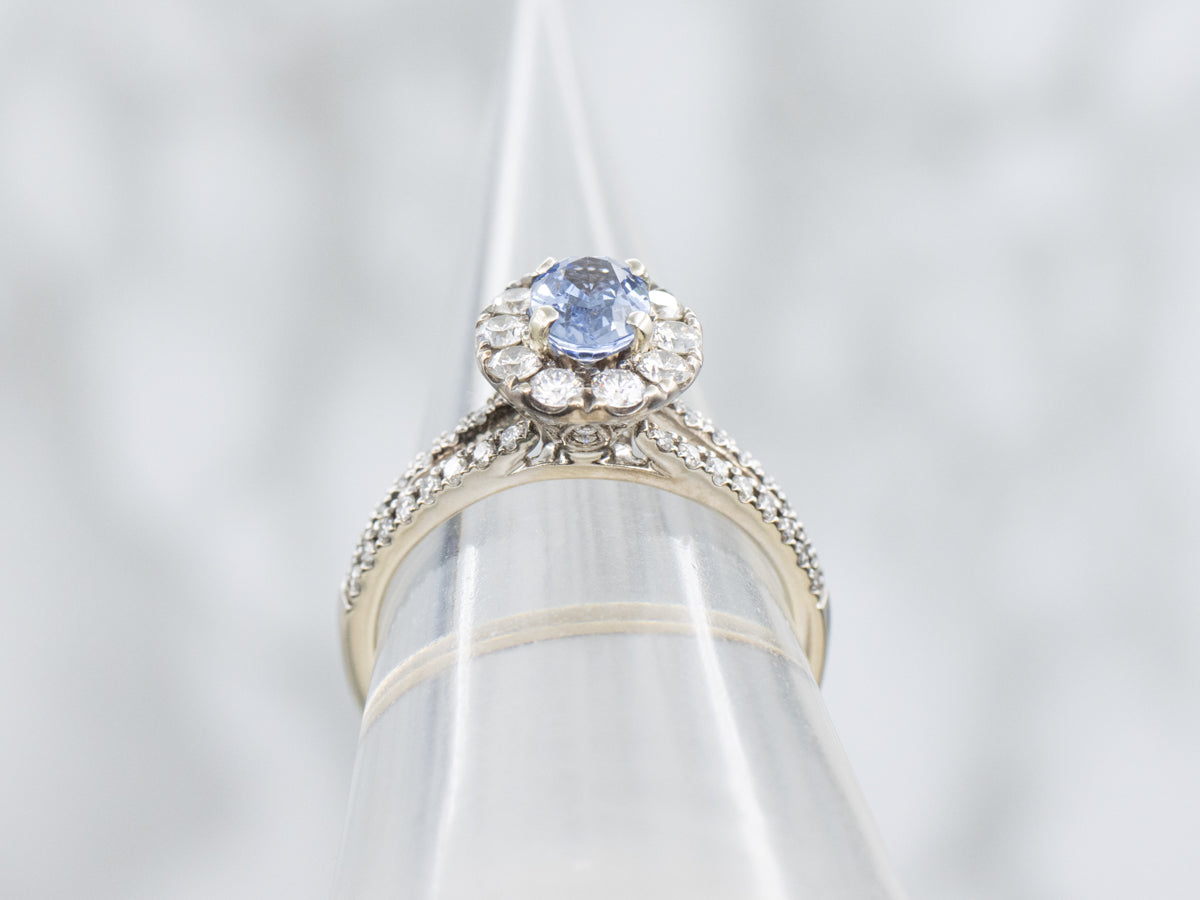 Pretty Sapphire and Diamond Halo Engagement Ring