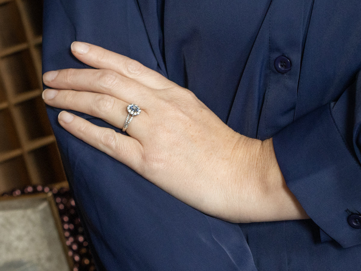 Pretty Sapphire and Diamond Halo Engagement Ring