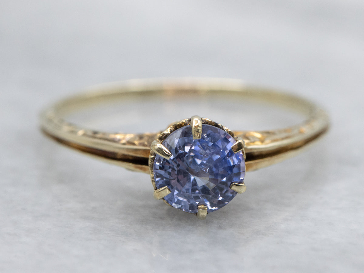 Beautiful Sapphire Solitaire in Scrolling Engraved Gold Setting