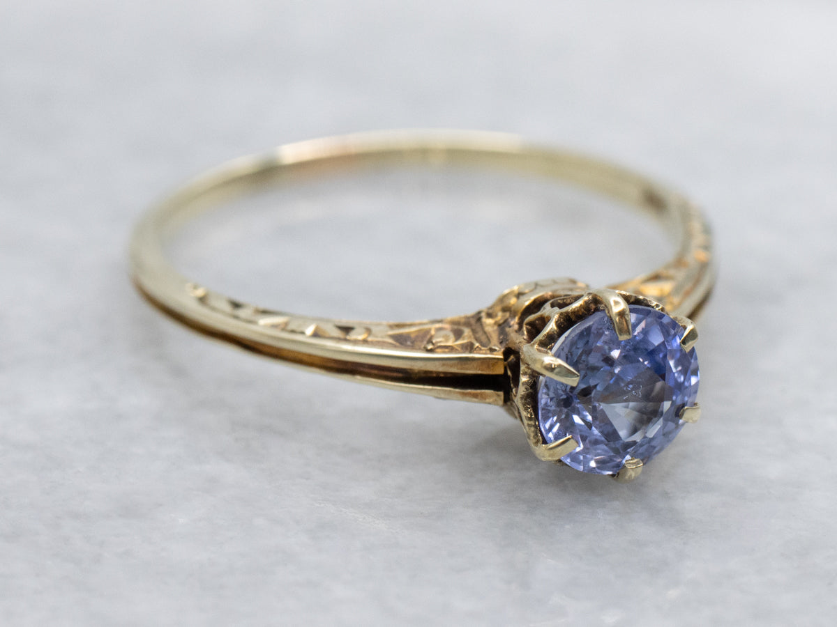 Beautiful Sapphire Solitaire in Scrolling Engraved Gold Setting