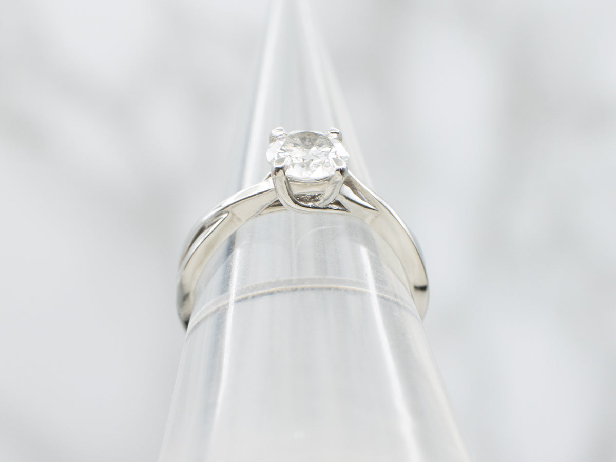 Brilliant Diamond Solitaire in Twisting Platinum Setting