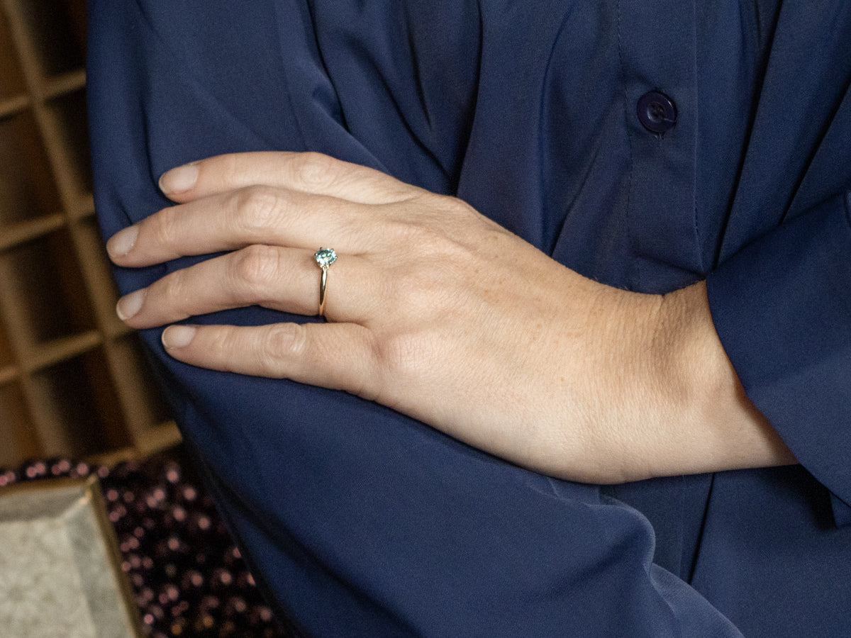 Sparkling Blue Zircon Solitaire Gold Ring