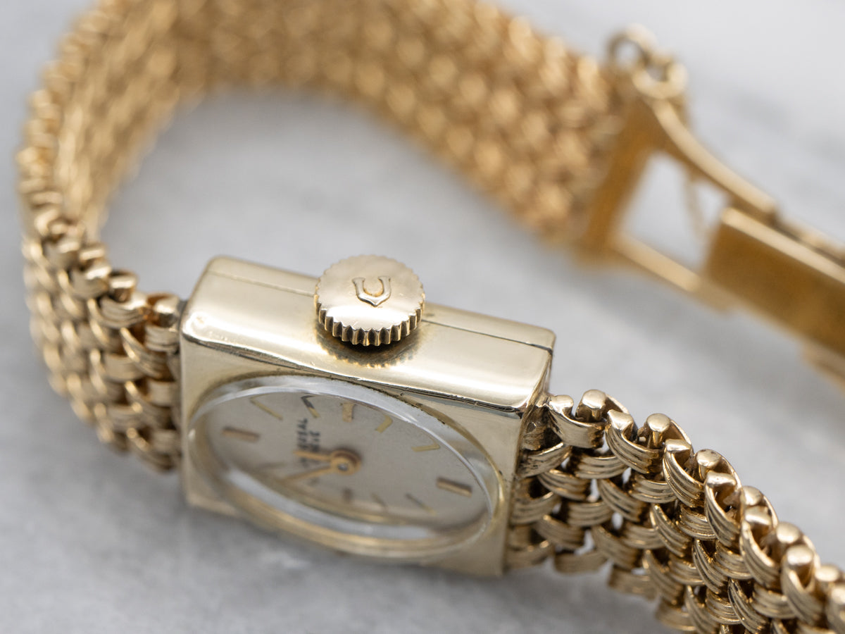 Universal Geneve Yellow Gold Ladies Wrist Watch with Safety Chain