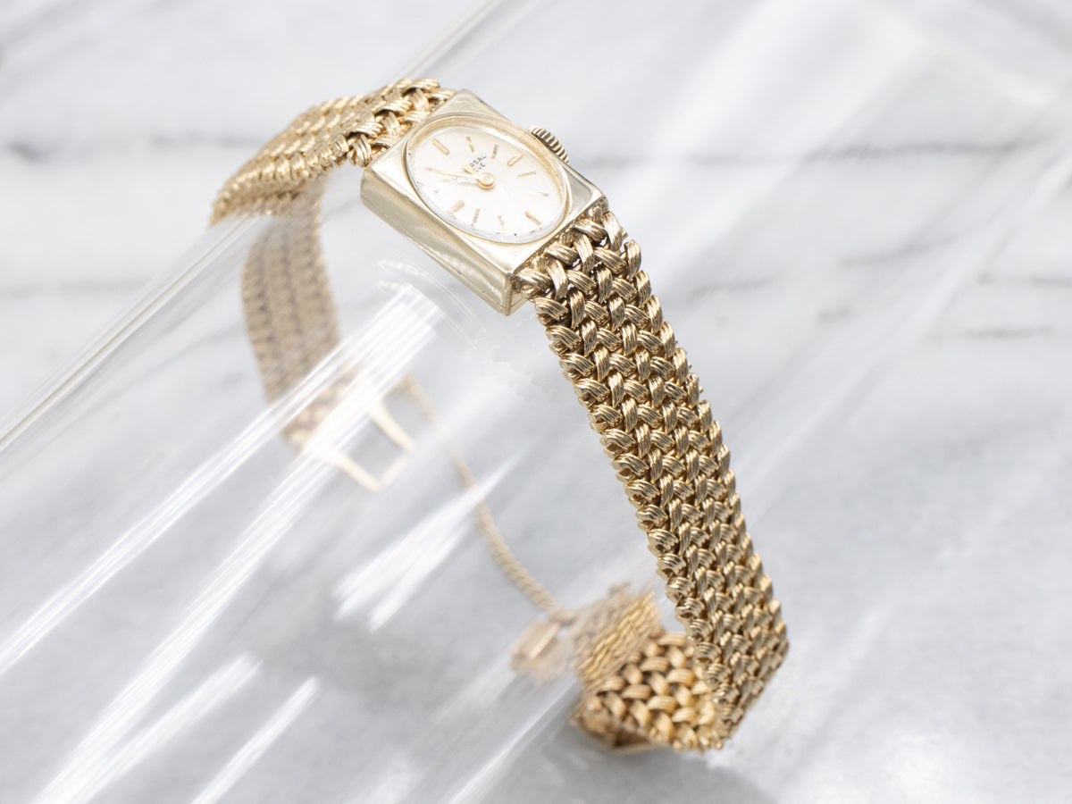 Universal Geneve Yellow Gold Ladies Wrist Watch with Safety Chain