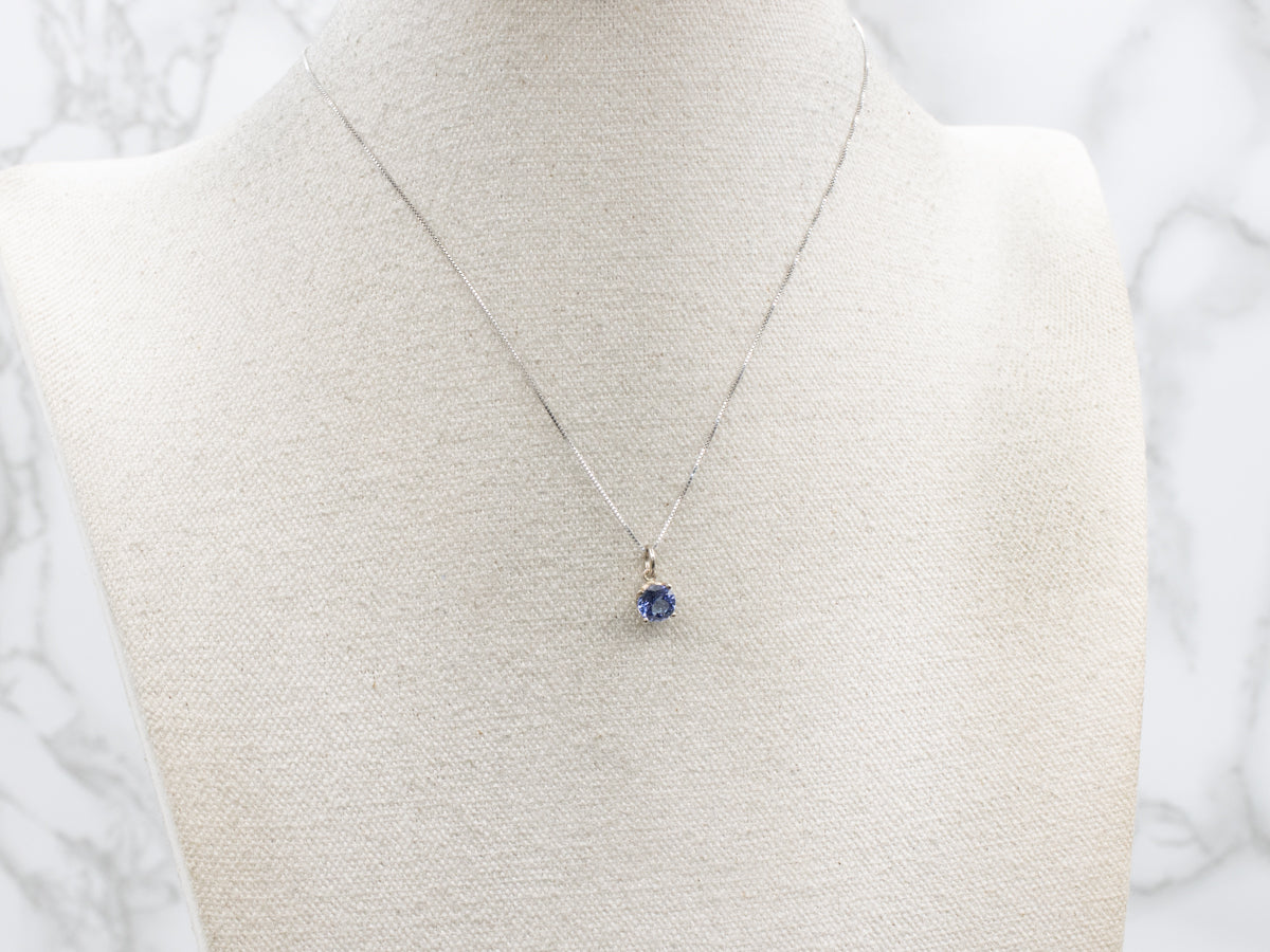 Round-Cut Tanzanite Solitaire Pendant in White Gold