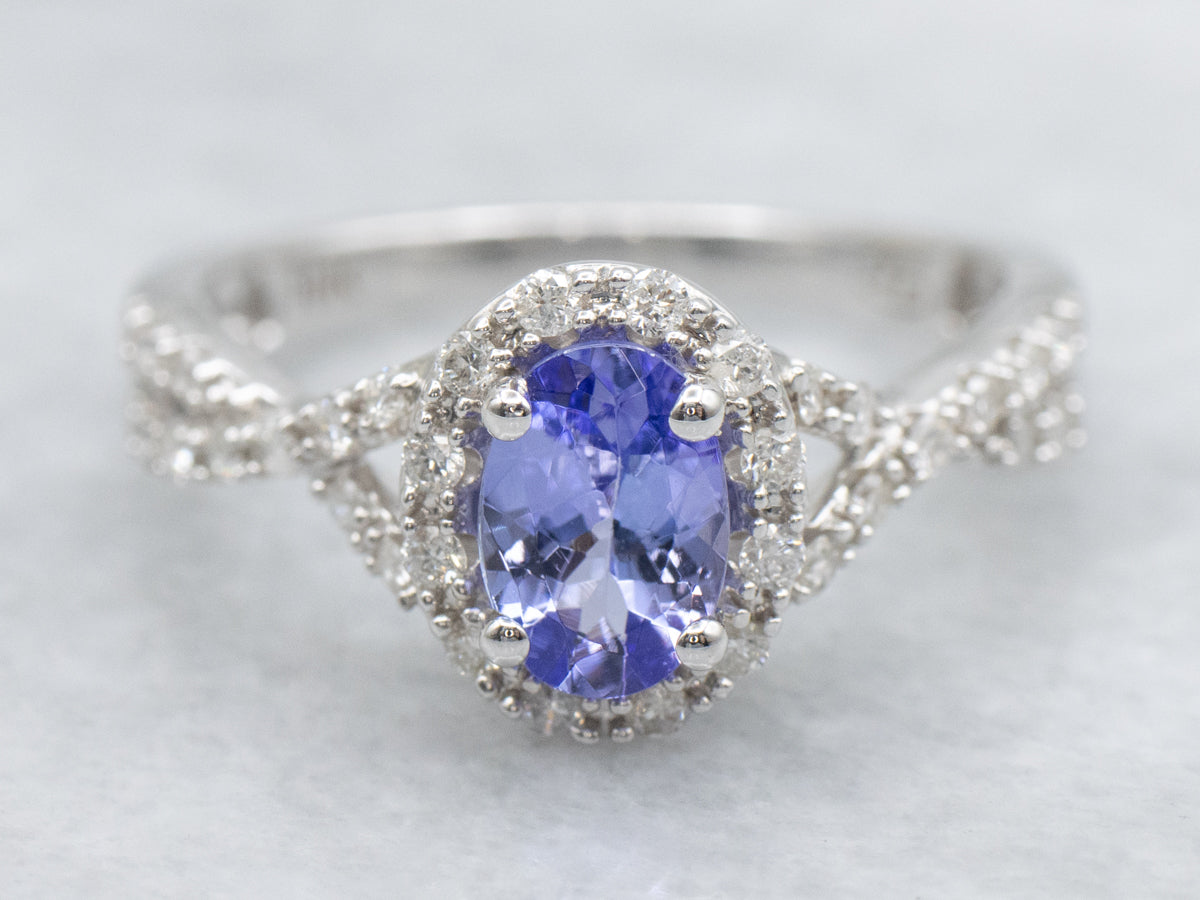 White Gold Twisting Tanzanite and Diamond Halo Ring