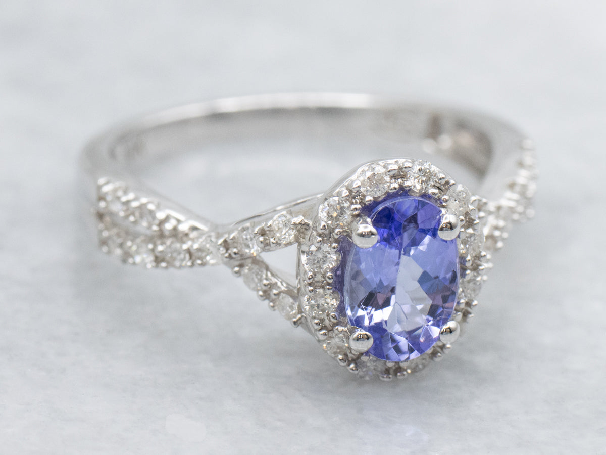 White Gold Twisting Tanzanite and Diamond Halo Ring