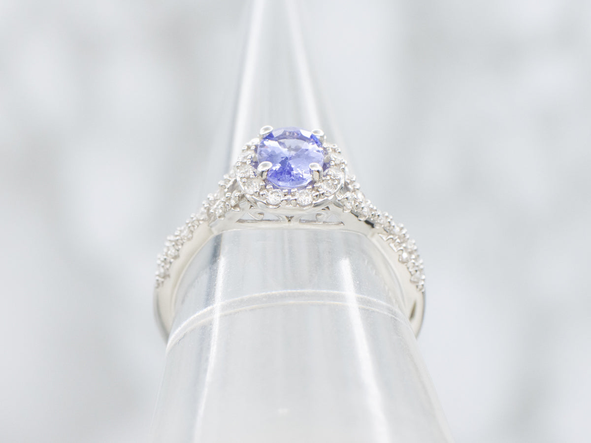 White Gold Twisting Tanzanite and Diamond Halo Ring