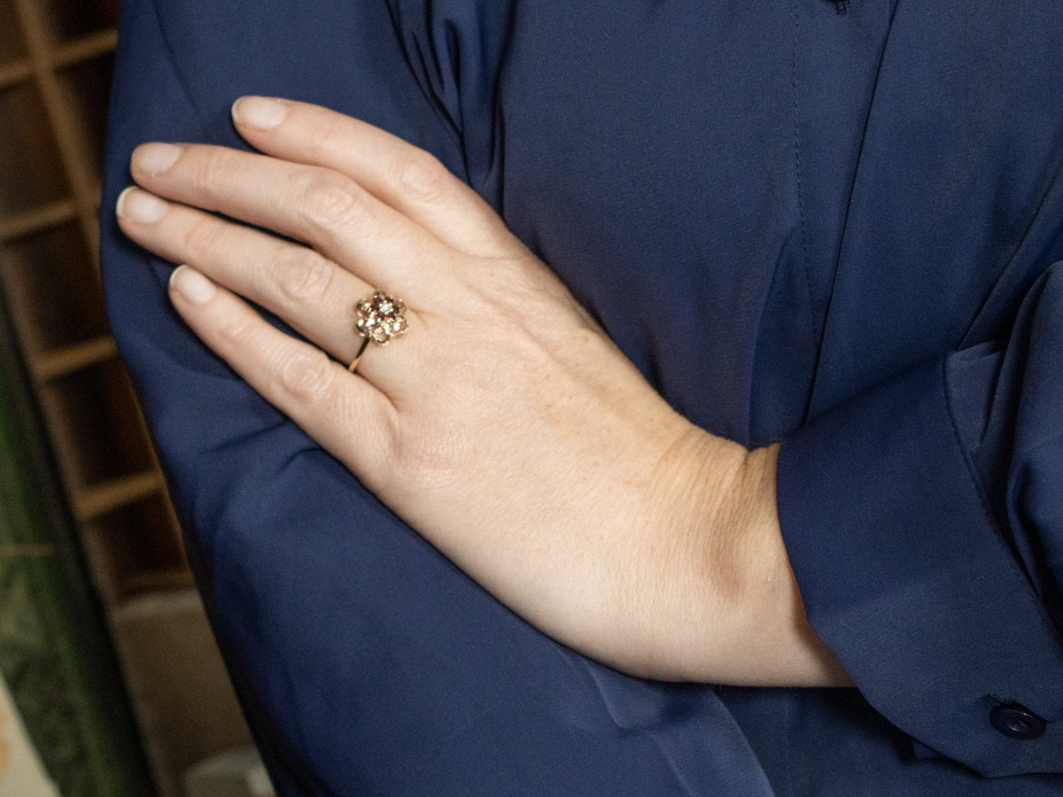 Vintage Gold Diamond and Garnet Floral Halo Ring