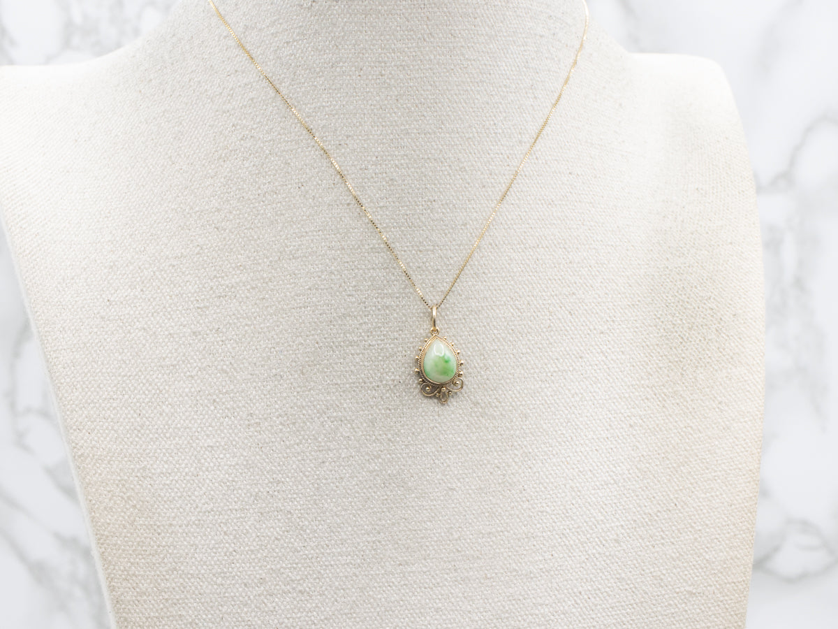 Teardrop Jadeite Scrolling Yellow Gold Pendant